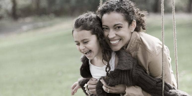Rosy retrospection happy woman with little girl