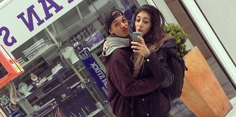 Couple on a date making duckface in a selfie Couple on a date making duckface in a selfie