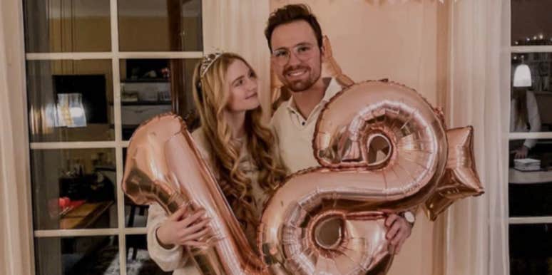 Joshua Wesely and girlfriend pose for her 18th birthday with balloons