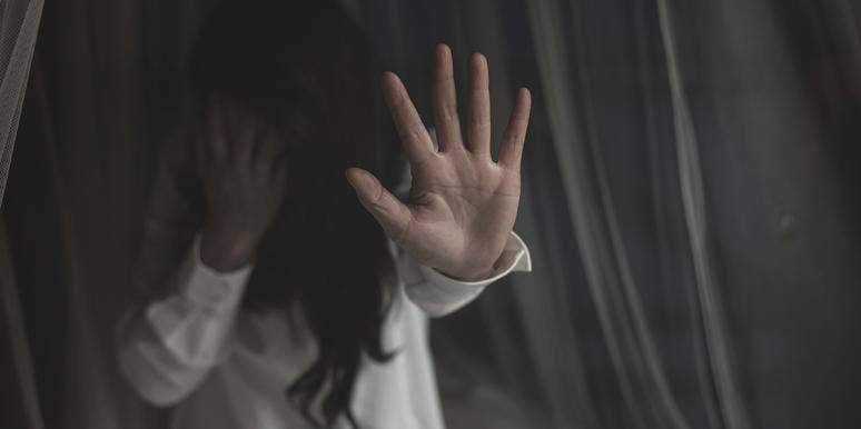 The Unbearable Shame Of Being An Abused Wife woman with hand on window
