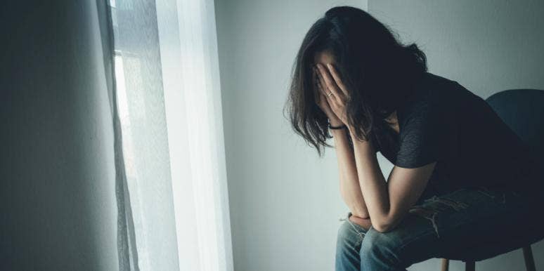What It's Like To Be Raised By An Abusive Mother sad woman