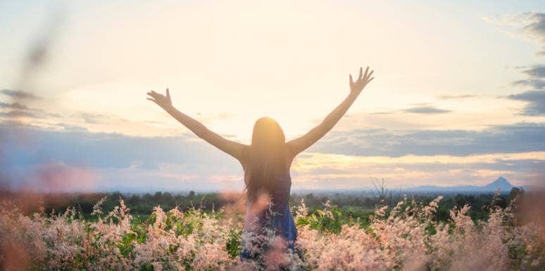 Have a Change of Plans? It's Best to Accept it. woman reaching out to sky