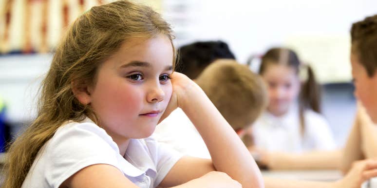 Advice to Help Kids Manage Their Feelings at School or With Friends young girl sitting in classroom at school