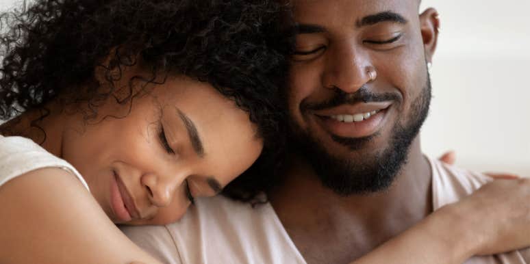 All The Ways A Man Quietly Tells You He Loves You woman hugging man