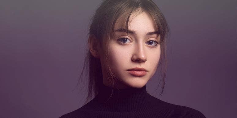 Am I Asexual? How to tell if someone is asexual pretty woman with bangs staring forward