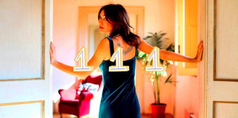 Angel Number 111 — Spiritual Meaning & Symbolism woman with angel wing tattoo and number 111
