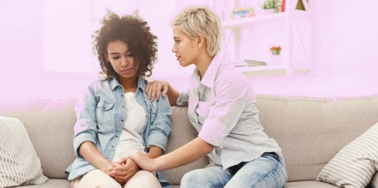 anxious attachment style couple on couch anxious attachment style couple on couch