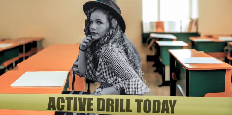 Teenager sitting in school classroom