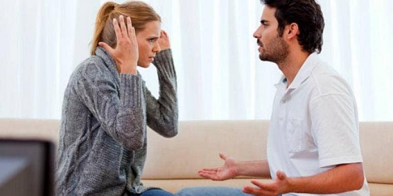 Is your marriage over? couple arguing on sofa