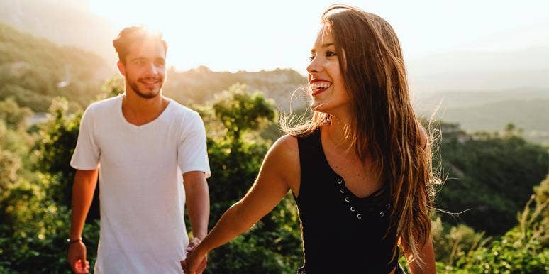 There's Only 4 Types Of Love Attachment Styles — Which Is Yours? couple holding hands