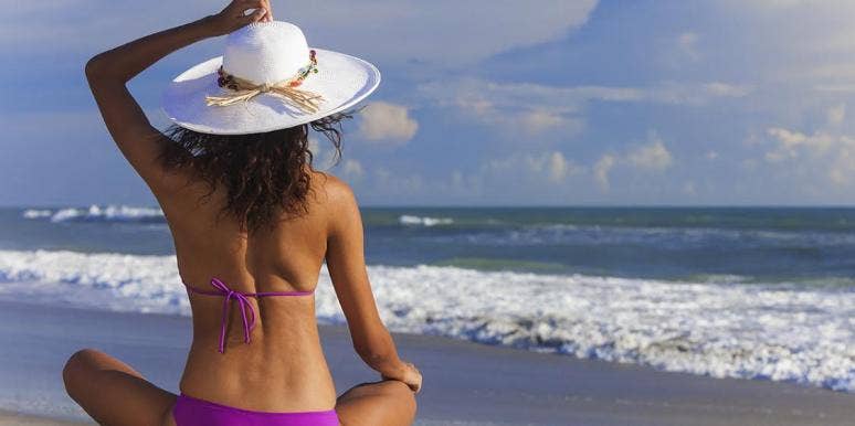 Back Dimples: Meaning, Causes & Facts About Dimples Of Venus woman on the beach with back dimples