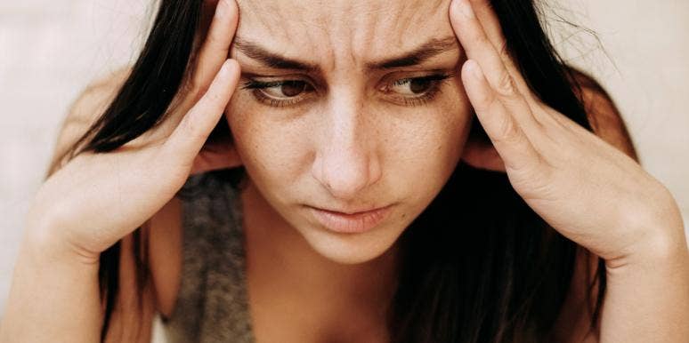 5 Steps For How To Get Rid Of Bad Karma woman stressed