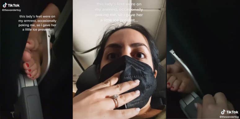 A Woman Finds A Way To Make Another Passenger Keep Her Bare Feet To Herself woman looking into camera with mask - feet on her armrest