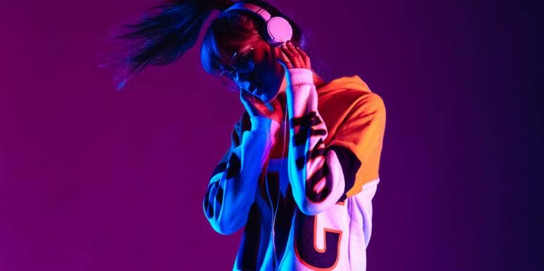 100 Best Music Videos Of All Time woman listening to music