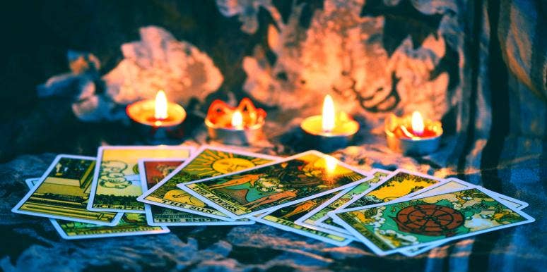 The Best Tarot Decks For You To Buy Online tarot cards surrounded by candles