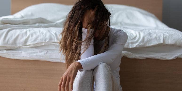 Divorce Regret: 5 Biggest Regrets Divorcees Have About Their Marriages Woman looking down with her head in her hand