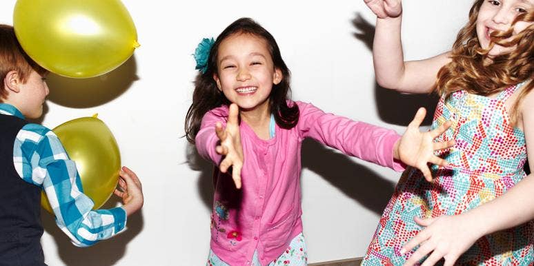 Dad Spends $39K On Kid's Disney-Themed Birthday Party kids with balloons