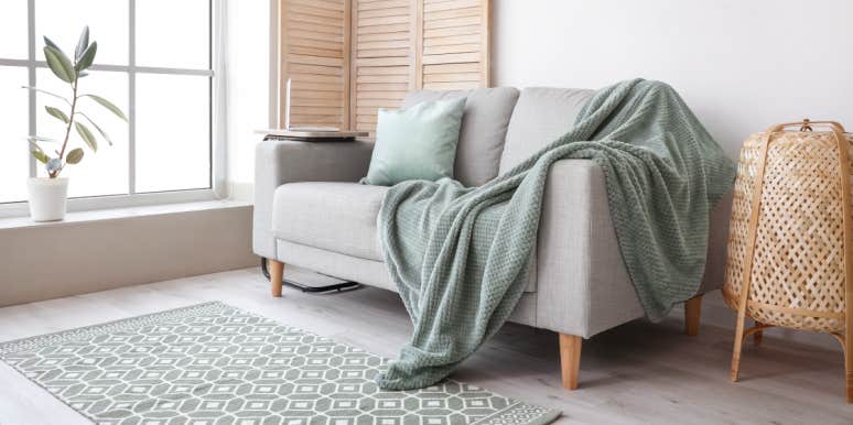 Man Regrets Throwing Out Autistic Best Friend's Security Blanket Because His Girlfriend Asked Him To Blanket on the couch