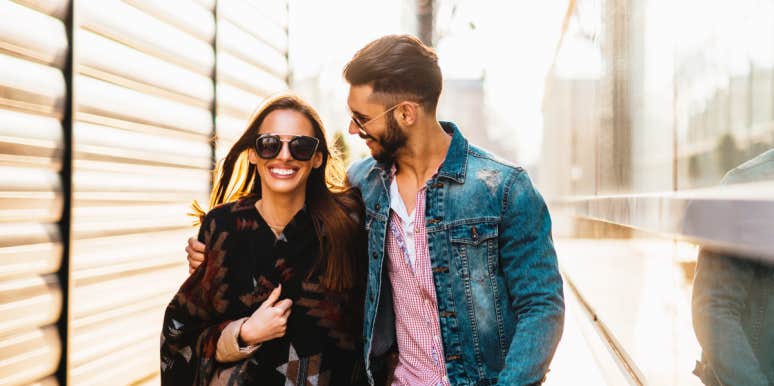 agreements couples make for blissful marriages man and woman walking near a building with a stark metal siding