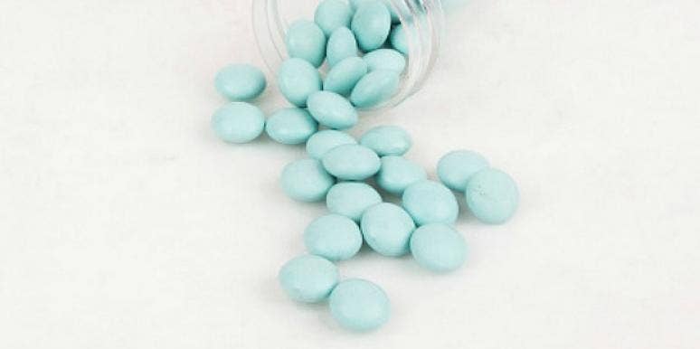 bottle of blue pills