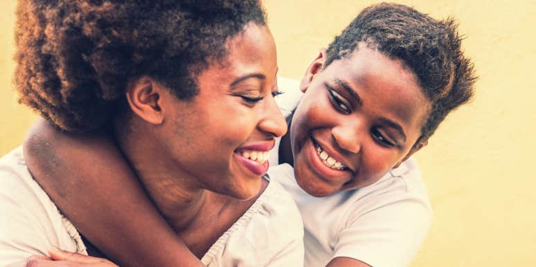 help kids with ADHD break bad habits elementary age boy smiles at his mom