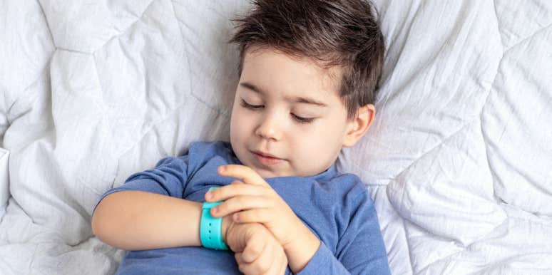 Co-Parent Insists On 4-Year-Old Wearing A Listening Device At All Times When At Other Parent's Home boy with smartwatch listening device