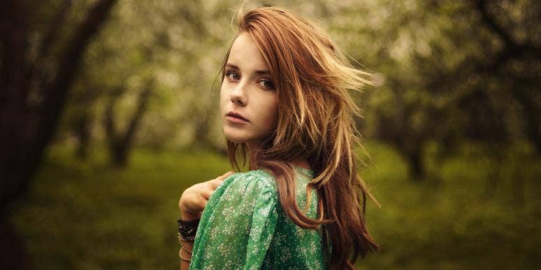 How To Be Strong And Move On After A Breakup & Love Again woman in the forest looking back