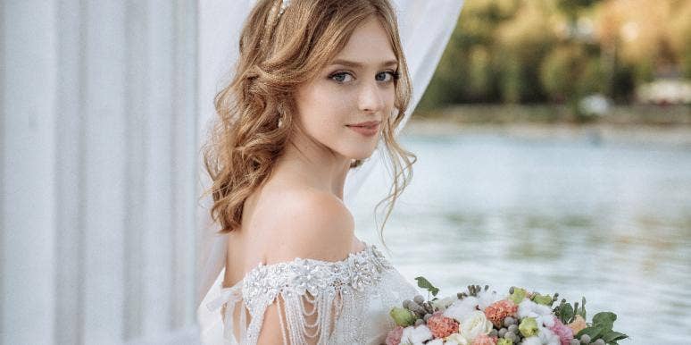 young bride holding bouquet