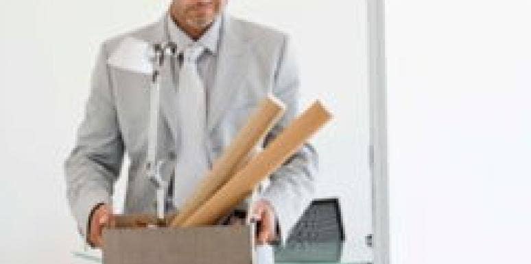 6 Ways To Cheer On An Unemployed Partner man-in-suit-carries-office-supplies