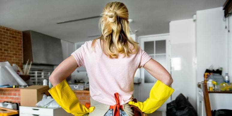 can't have anyone over syndrome woman with hands on hips looking at messy house