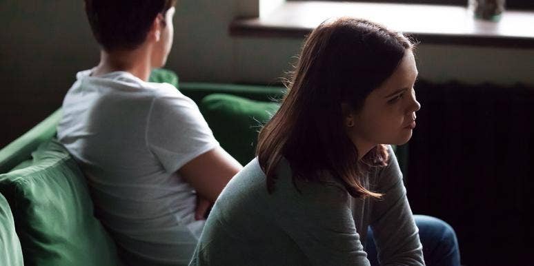 I Can't Love You If You Won't Let Me In couple on the couch looking away from each other