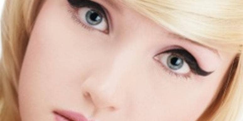 5 Steps To Sexy Mad Men Eye Makeup woman with cat eye mad men makeup