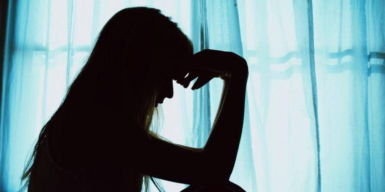 cheaters' remorse woman's silhouette by the window