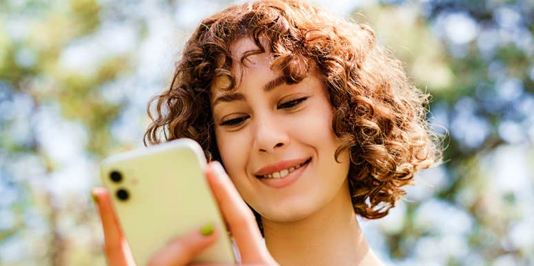 Coping skill phone list Woman checks her list of coping skills on her phone