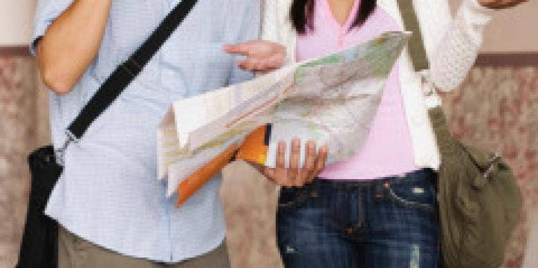 Why Do Men Do THAT? Answers To Your Top 10 Questions lost asian couple with map argues about directions