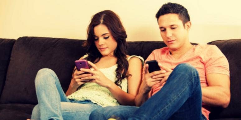couple on cell phones couple on cell phones