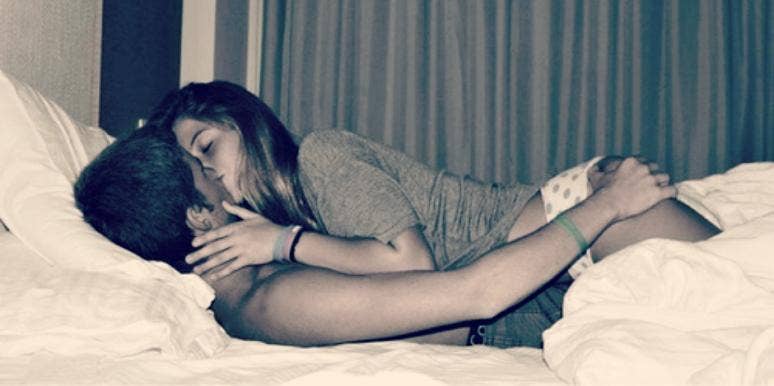 couple in bed makeout couple in bed makeout