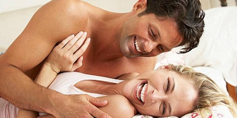 couple laughing in bed couple laughing in bed
