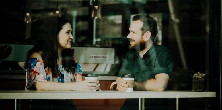 Couple talking over a coffee