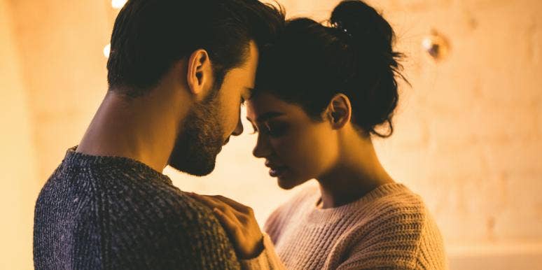 The Real Reason Facebook Causes One-Third Of Divorces man and woman touching foreheads