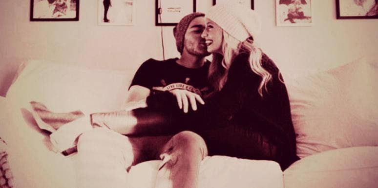 couple sitting on couch couple sitting on couch