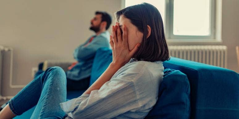 couples counseling with a narcissist upset woman sitting on the couch with man