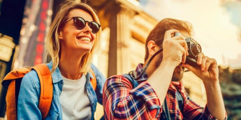 How To Create A Vision Board For 2021 That Actually Works man and woman taking pictures outside