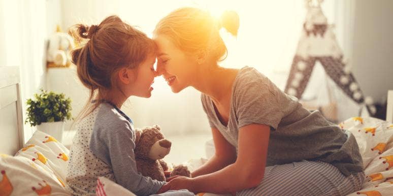 2 Critically Important Words You Forget To Say To Your Kids mom and child locking foreheads