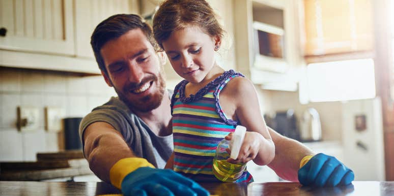 dad and daughter cleaning