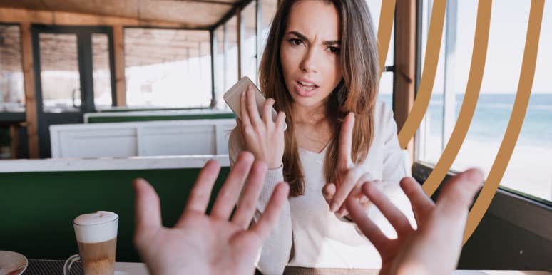 Woman setting boundary with demanding man while she takes a call