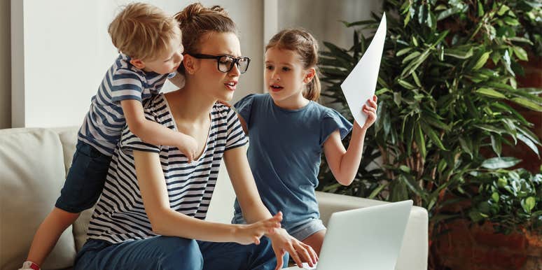 Dear Moms, Stop Complaining! You CHOSE To Have Kids, Remember? stressed mom working with kids bothering her