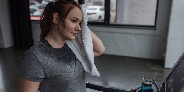 What Happened To My Love Life When I Stopped Wearing Deodorant woman sweating on a treadmill