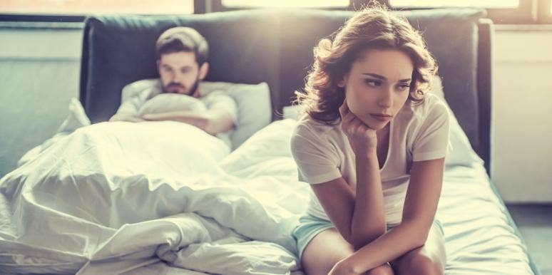 depression and low sex drive sad couple in bed