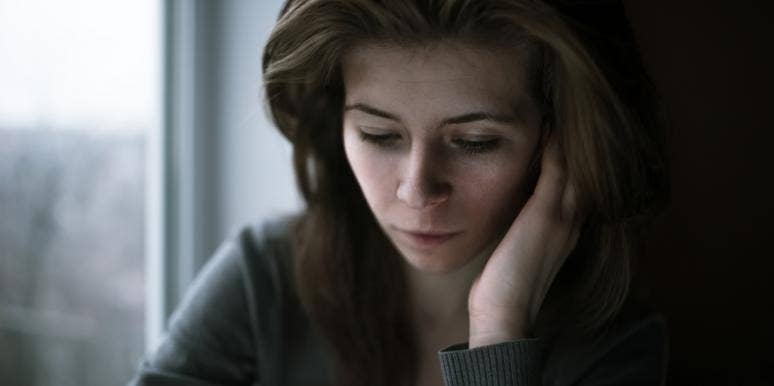I didn't know it was rape. I thought I was being a good wife. sad woman
